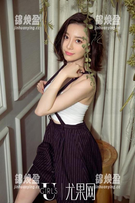 尤果网-曲铭瑄 尤果网 - 最新写真:曲铭瑄的油亮表情,真让人忍不住想摸!